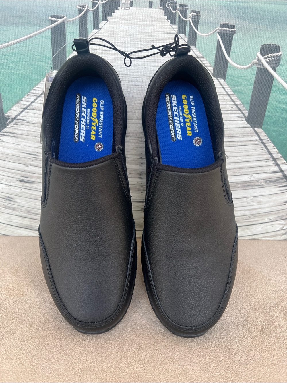 Skechers Women’s Black Slip-On Loafers with Blue Insole